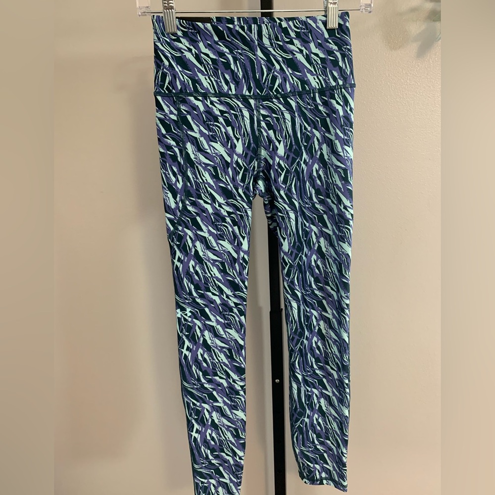 NWT Under Armour Greens and Purple Compression Leggings